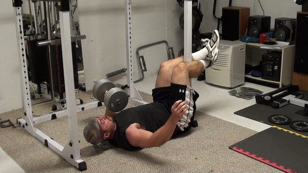 Killer MMA-Style Core, Adductor and Chest Exercise...Feet Anchored One-Arm Dumbell Floor Press 