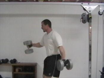 Double Dumbell Swings For Total Abdominal Training